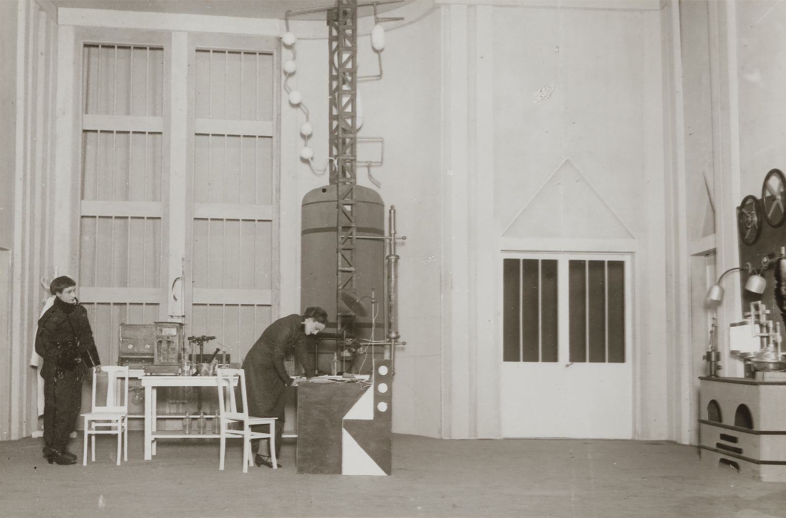 Actors on stage in a 1924 Paris production of Karel Čapek's play R.U.R.